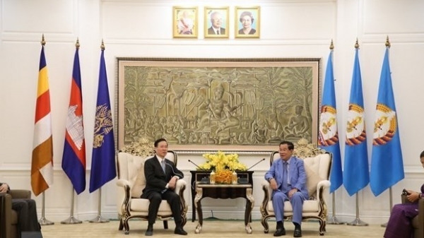 Party official meets with Cambodian leaders during visit to Cambodia