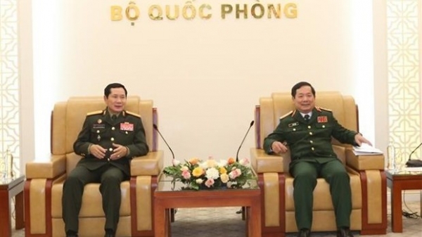 Vietnam, Laos step up practical cooperation in defence