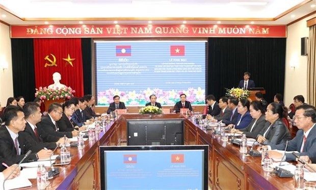 Vietnam, Laos step up cooperation in mass mobilisation