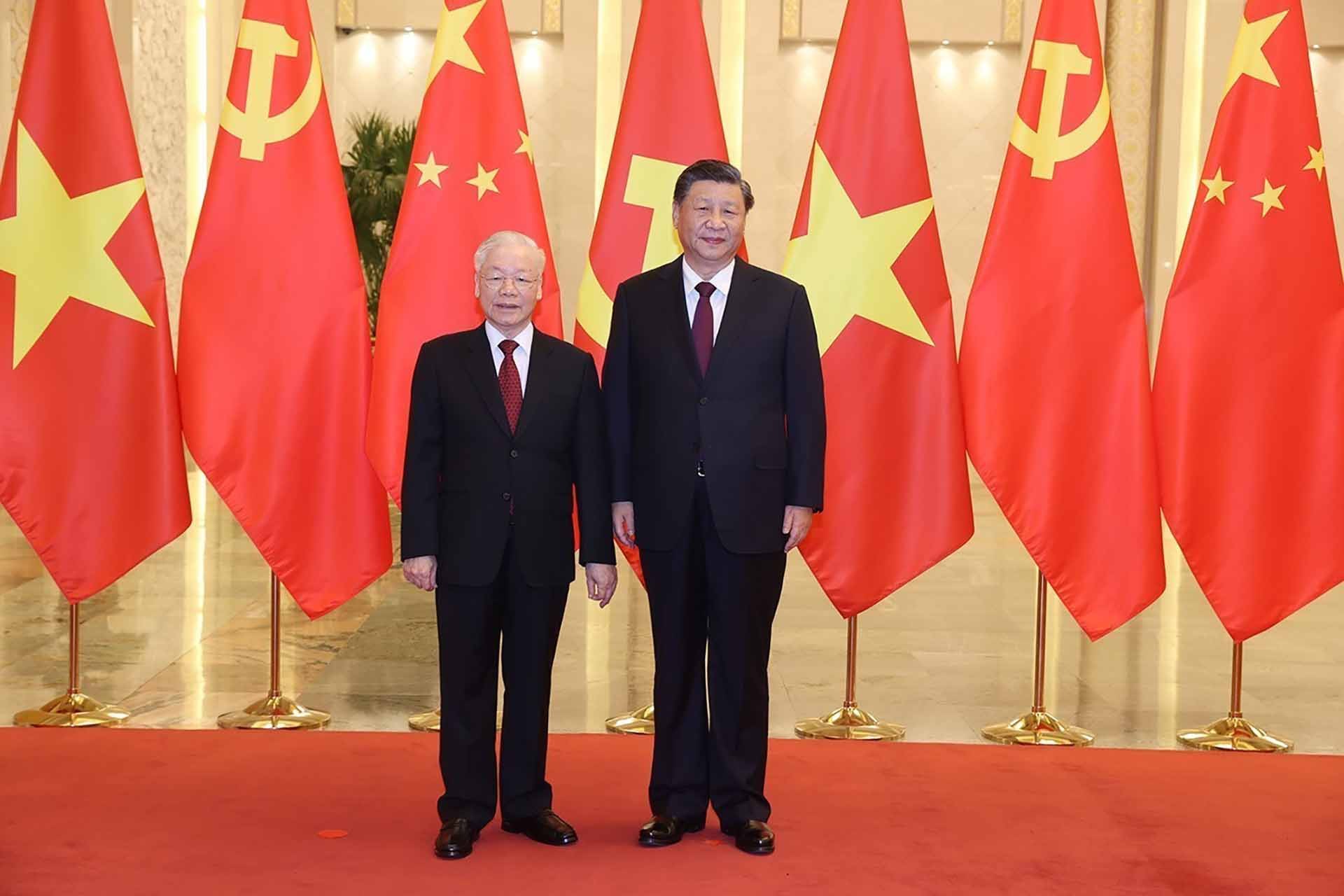 Tổng Bí thư, Chủ tịch Trung Quốc Tập Cận Bình đón Tổng Bí thư Nguyễn Phú Trọng. (Nguồn: TTXVN)