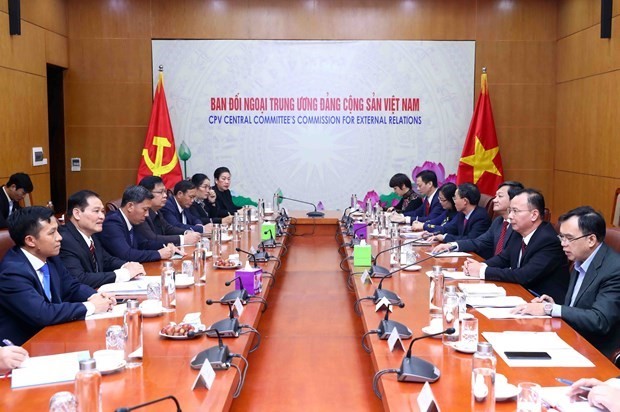 Vietnam, Laos share mass mobilisation experience