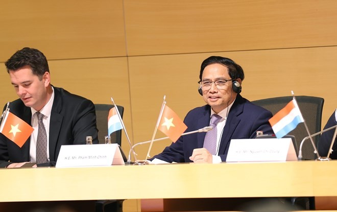 Prime Minister Pham Minh Chinh attends Vietnam-Luxembourg business forum. (Photo: VNA)