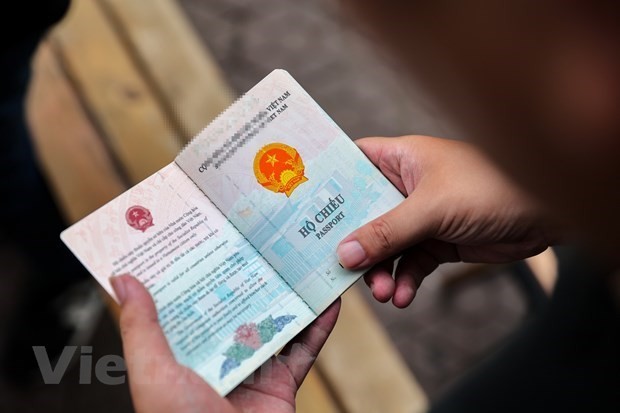 People with a Vietnamese passport enjoy free entry or are just required an e-visa or a visa on arrival to 55 countries and territories globally. (Photo: VNA)