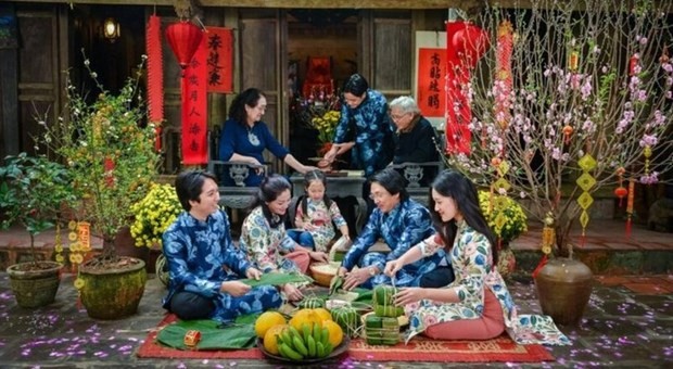 Lunar New Year is also an occasion for foreigners to experience the traditional culture of Vietnam. (Source: VNA)