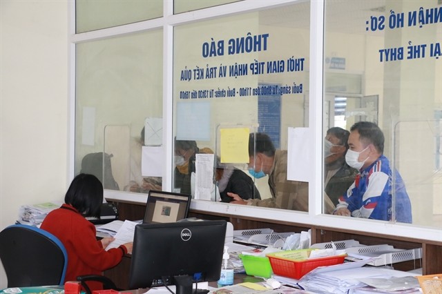 Providing public services in Nghe An. (Source: VNA
