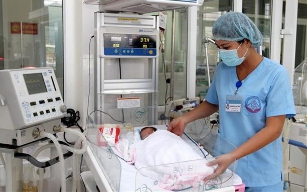 New-born screening at the National Hospital of Obstetrics and Gynecology. (Source: VNA)