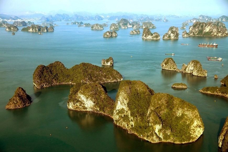 Thousands of islands with all shapes in the middle of the vast sky, creating unique wonders for Ha Long Bay. (Photo: VNA)