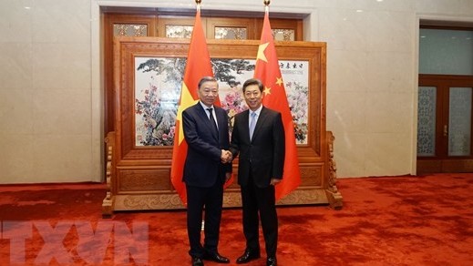 Minister of Public Security  To Lam meets Chinese officials in Beijing