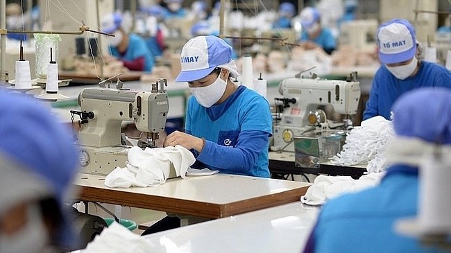 How can Vietnamese textile brands enhance their competitiveness in the international market?