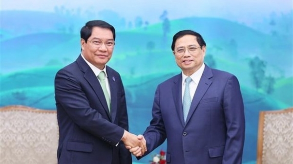 PM Pham Minh Chinh receives Vientiane's Mayor, praising Hanoi-Vientiane cooperation