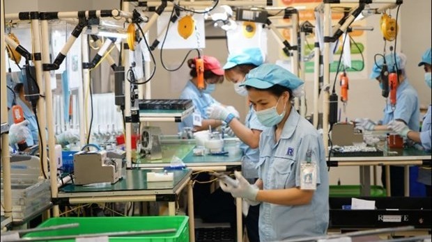 Hanoi seeks to improve role of manufacturing, processing