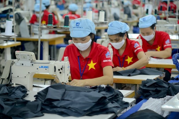 Many global textile and garment conglomerates target net zero by 2050, requiring their supply chains across countries, including Vietnam, to follow suit. (Photo: VNA)