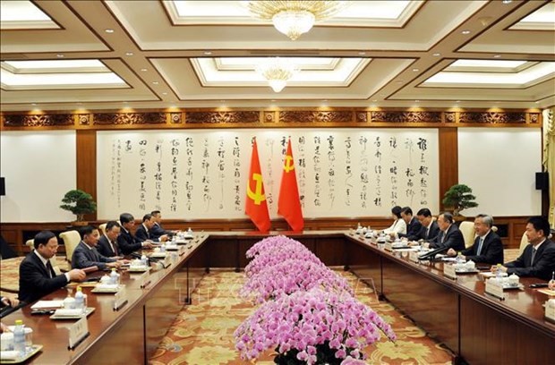 CPV Politburo member Tran Cam Tu visits China