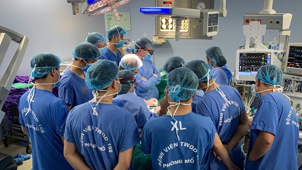 Doctors from Facing the World (FTW) - a UK-registered medical charitable foundation and Vietnam's 108 Central Military Hospital conduct a complicated craniofacial trauma surgery in 2019. (Photo: The Courtesy of FTW)