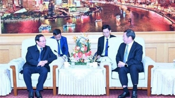 Ho Chi Minh City Party Secretary, holds talks with Party Secretary of China’s Shanghai city