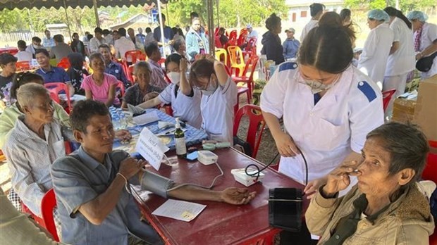 Doctors from Vietnam's University provide free health check-ups for people in Laos