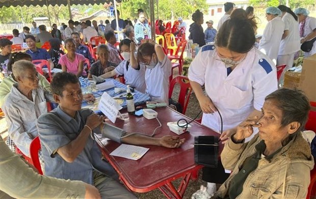 Doctors from Vietnam's University provide free health check-ups for people in Laos