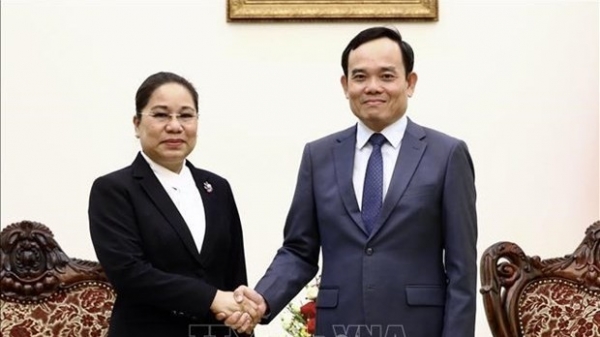 Deputy PM Tran Luu Quang hosts Lao Minister of Information, Culture, Tourism