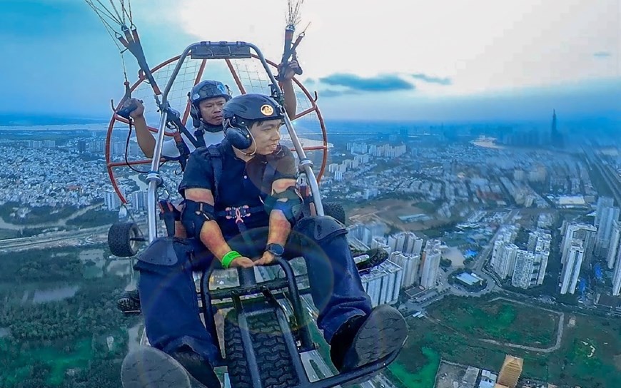 Admiring Ho Chi Minh City while paragliding