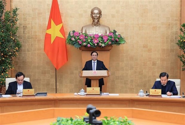 Prime Minister Pham Minh Chinh addresses the Government meeting (Photo: VNA)