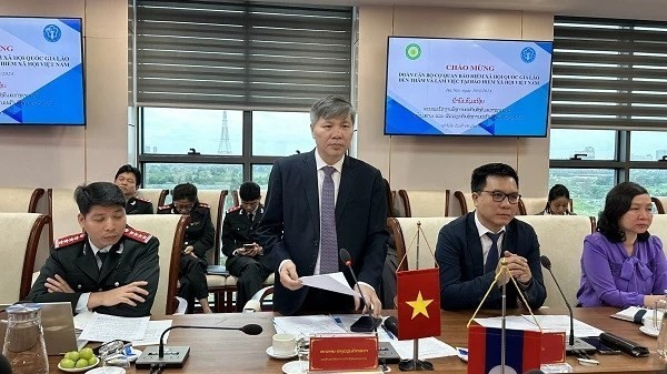 Vietnam, Laos officials hold working session to enhance social security cooperation