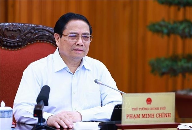 Prime Minister Pham Minh Chinh addresses the meeting (Photo: VNA)