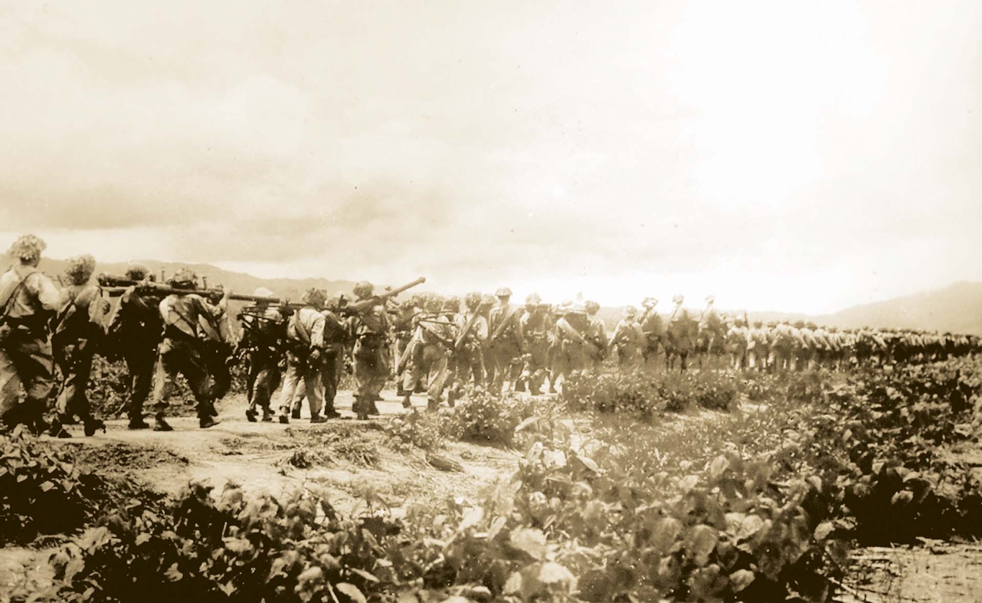 Vietnamese army marching to the Northwest in 1954.