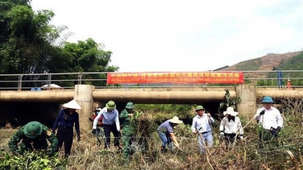 Vietnamese and Chinese localities collaborate to cleanse border river