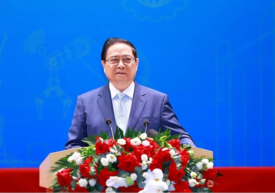 PM Pham Minh Chinh speaks at the forum. (Photo: VNA)