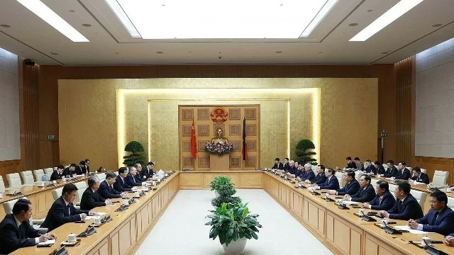Prime Minister Pham Minh Chinh hosts China's top political advisor in Hanoi Prime Minister Pham Minh Chinh hosts China's top political advisor Wang Huning in Hanoi