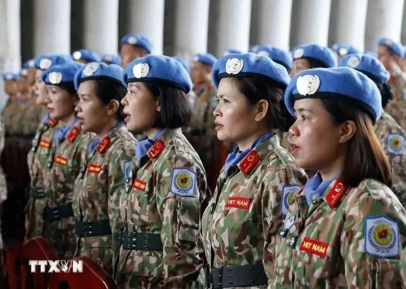 Female soldiers of the Engineering Unit Rotation 2 at a ceremony before leaving for the United Nations peacekeeping mission in Abyei. (Photo: VNA) Female soldiers of the Engineering Unit Rotation 2 at a ceremony before leaving for the United Nations peacekeeping mission in Abyei. (Photo: VNA)