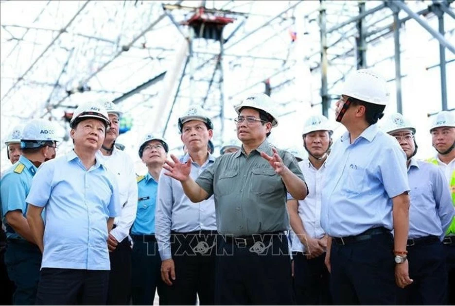 Prime Minister Pham Minh Chinh examines the construction of Terminal T3 of Tan Son Nhat International Airport in Ho Chi Minh City on August 10. (Photo: VNA) Prime Minister Pham Minh Chinh examines the construction of Terminal T3 of Tan Son Nhat International Airport in Ho Chi Minh City on August 10. (Photo: VNA)