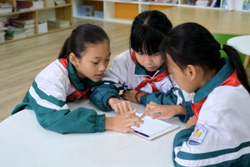 Despite equipment shortage, students remain diligent in their studies.