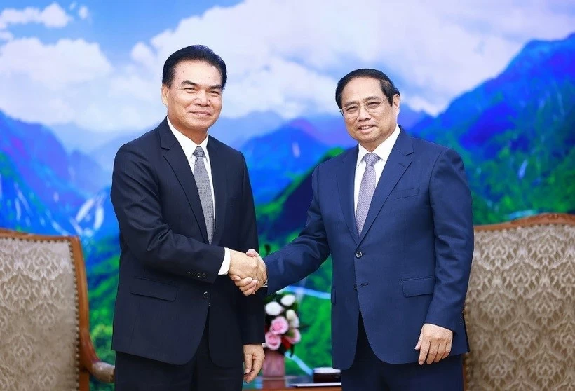 PM receives Lao Minister of Planning and Investment Phet Phomphiphak in Hanoi PM receives Lao Minister of Planning and Investment Phet Phomphiphak in Hanoi