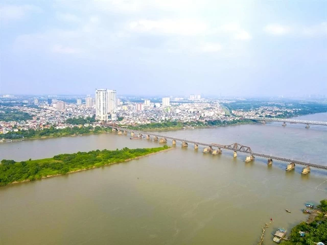 A view of the Red River in Hanoi. The Red River region's economic growth rate reached 7.21 per cent in the first seven months of this year, higher than the national average. (Photo: VNA/VNS) A view of the Red River in Hanoi. The Red River region's economic growth rate reached 7.21 per cent in the first seven months of this year, higher than the national average. (Photo: VNA/VNS)