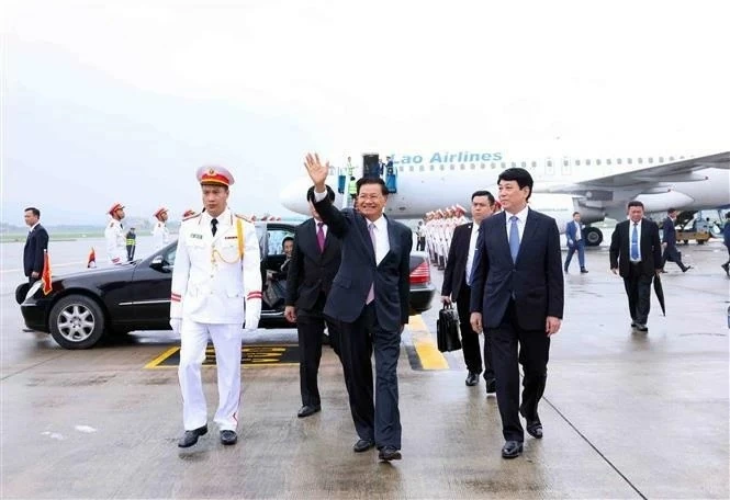 General Secretary, President of Laos begins state visit to Vietnam