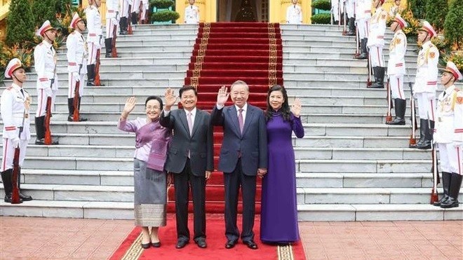 General Secretary, President of Laos thanks Vietnam following state visit