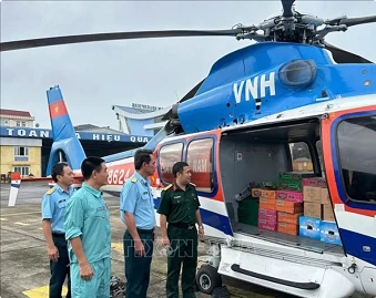 More helicopters take flight to transport relief packages for flood victims More helicopters take flight to transport relief packages for flood victims