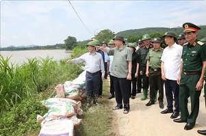 Top leader pledges swift relief delivery in flood-hit Tuyen Quang Top leader pledges swift relief delivery in flood-hit Tuyen Quang