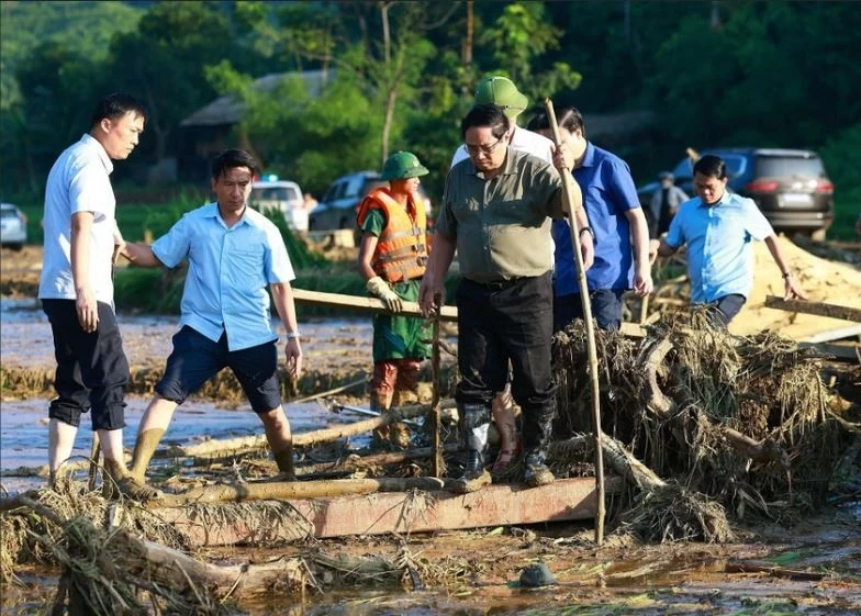 Prime Minister Pham Minh Chinh visited Nu Village in Phuc Khanh commune, Bao Yen district, Lao Cai province to oversee and direct search, rescue, and recovery operations following a recent landslide. (Photo: VNA) Prime Minister Pham Minh Chinh visited Nu Village in Phuc Khanh commune, Bao Yen district, Lao Cai province to oversee and direct search, rescue, and recovery operations following a recent landslide. (Photo: VNA)