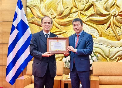 Greek diplomat honoured with friendship insignia Greek diplomat honoured with friendship insignia