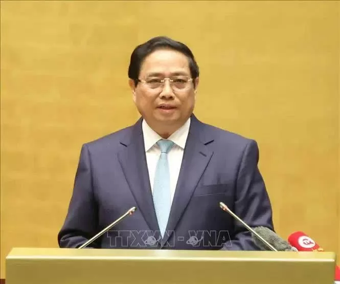 Prime Minister Pham Minh Chinh delivers a report at the national conference on December 1 to review the implementation of Resolution No. 18-NQ/TW issued by the 12th Party Central Committee.(Photo: VNA) Prime Minister Pham Minh Chinh delivers a report at the national conference on December 1 to review the implementation of Resolution No. 18-NQ/TW issued by the 12th Party Central Committee.(Photo: VNA)