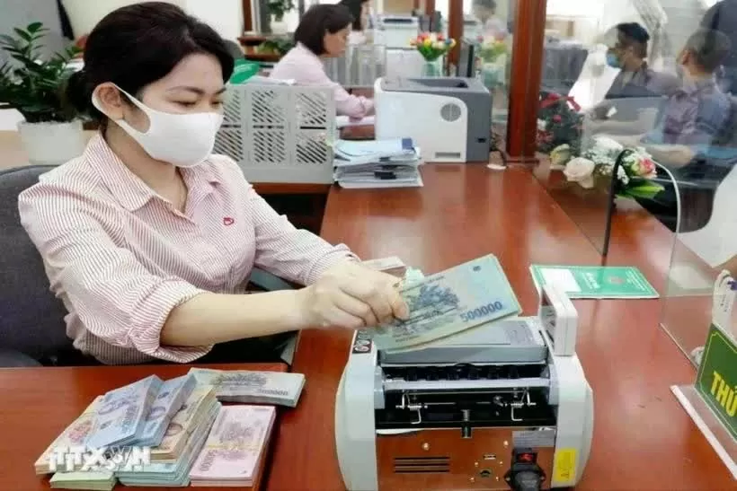 Reference exchange rate drops 4 VND on January 22