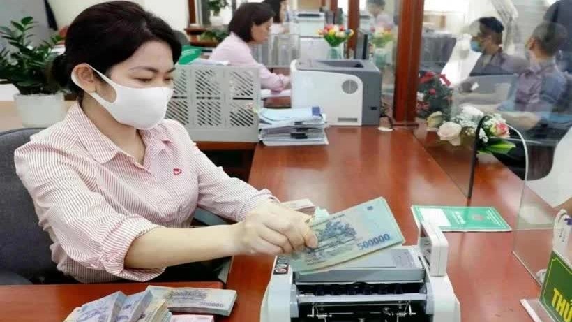 Reference exchange rate for the US dollar at 24,332 VND/USD on January 22, down 4 VND