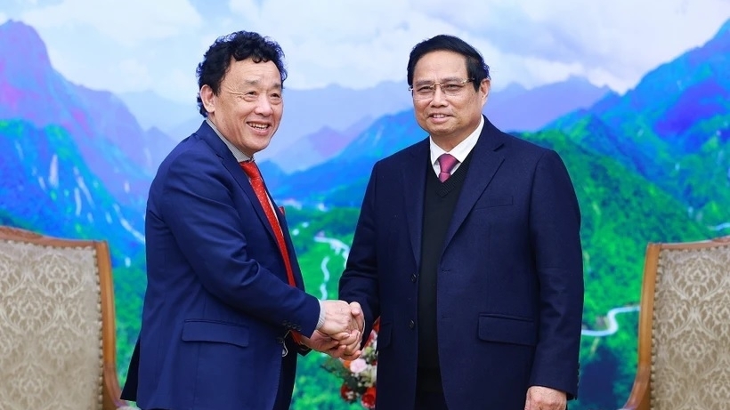 Prime Minister Pham Minh Chinh receives FAO Director-General Qu Dongyu in Hanoi