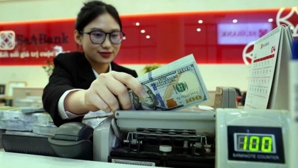 Reference exchange rate for the US dollar at 24,807 VND/USD on March 20, up 17 VND