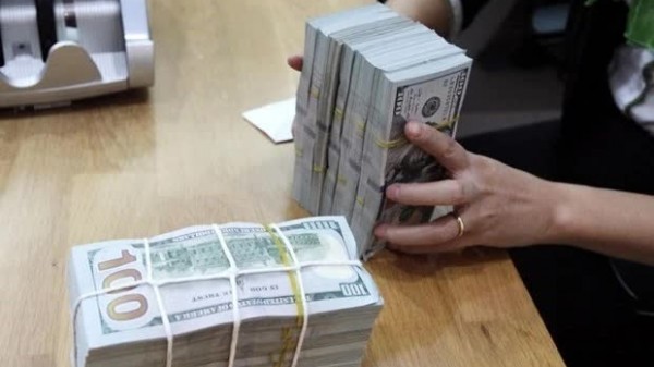 Reference exchange rate for the US dollar at 24,758 VND/USD on March 12, down 5 VND