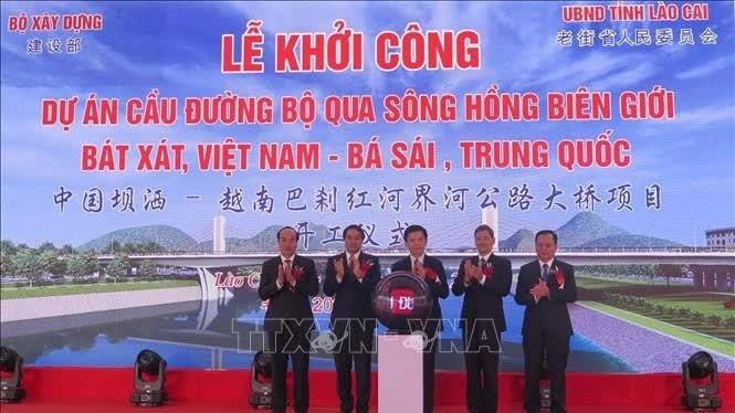 Vietnam, China build cross-border bridge linking Lao Cai and Yunnan