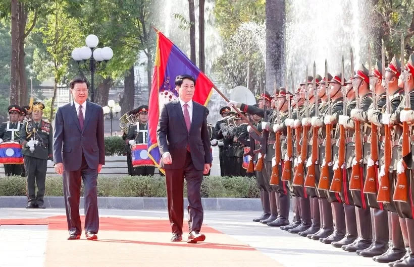 Top Lao leader hosts welcome ceremony for Vietnamese President Top Lao leader hosts welcome ceremony for Vietnamese President