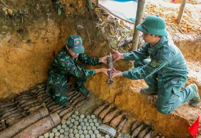 Collecting UXO in Ha Giang province in July 2023. (Photo: VNA)